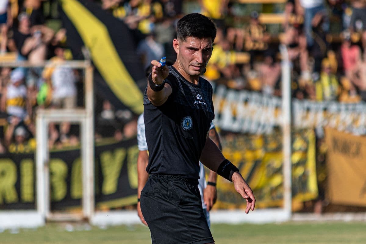 Referee making a call during a match