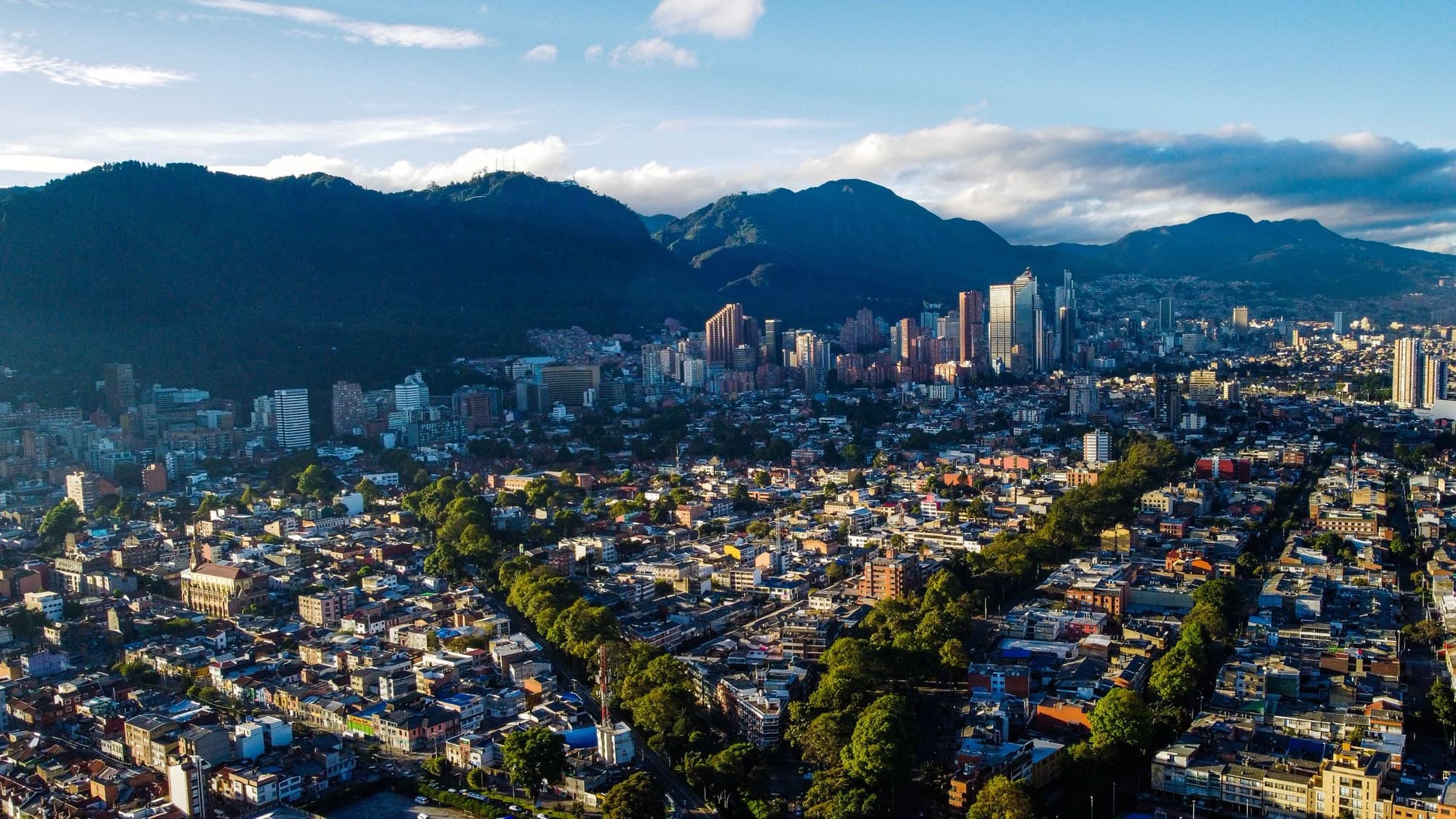Bogotá skyline against the Andes at golden hour
